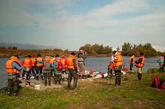 we take our seats in the inflatable rafts