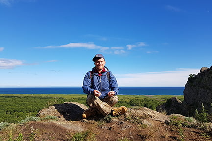 lotus pose on a rock